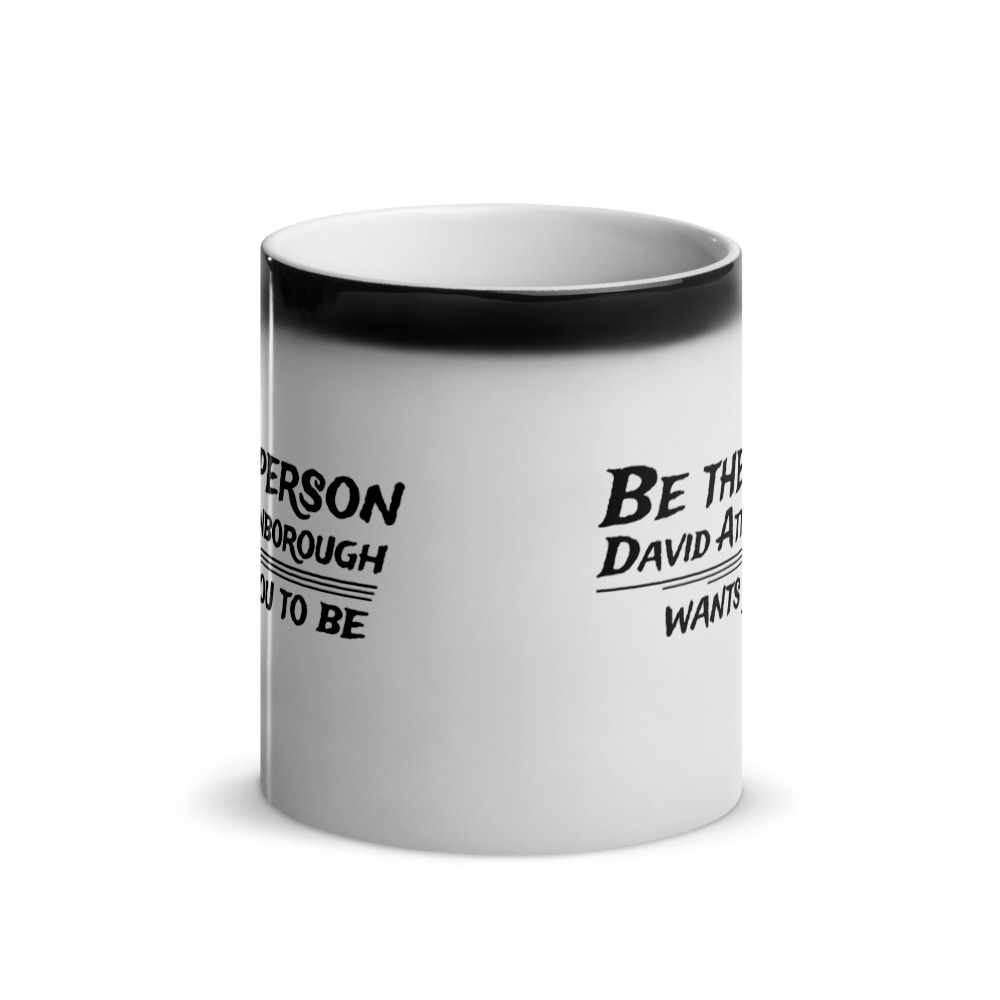 glossy-black-magic-mug-front-view-6186c8ce16fa4.jpg